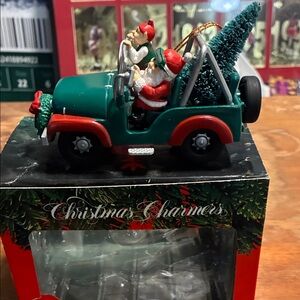 Santa in Green Jeep 1997 collectible ornament with box